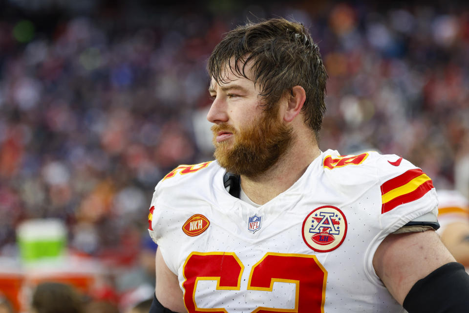 Kansas City Chiefs guard Joe Thuney (62) on the sideline during the second half of an NFL football game against the New England Patriots on Sunday, Dec. 17, 2023, in Foxborough, Mass. (AP Photo/Greg M. Cooper)