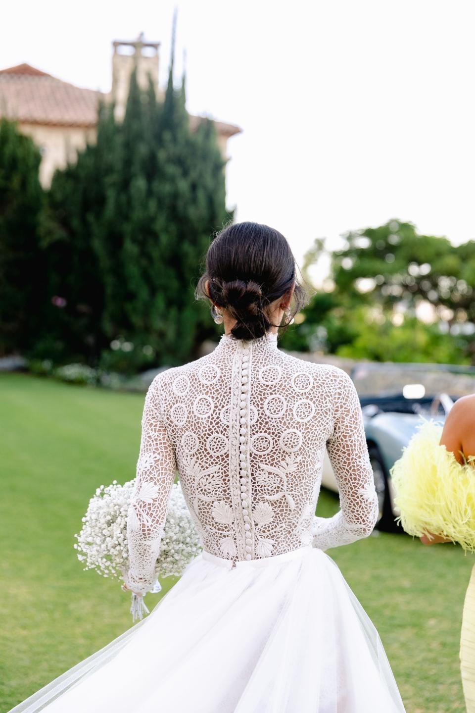 The back of a bride's dress.