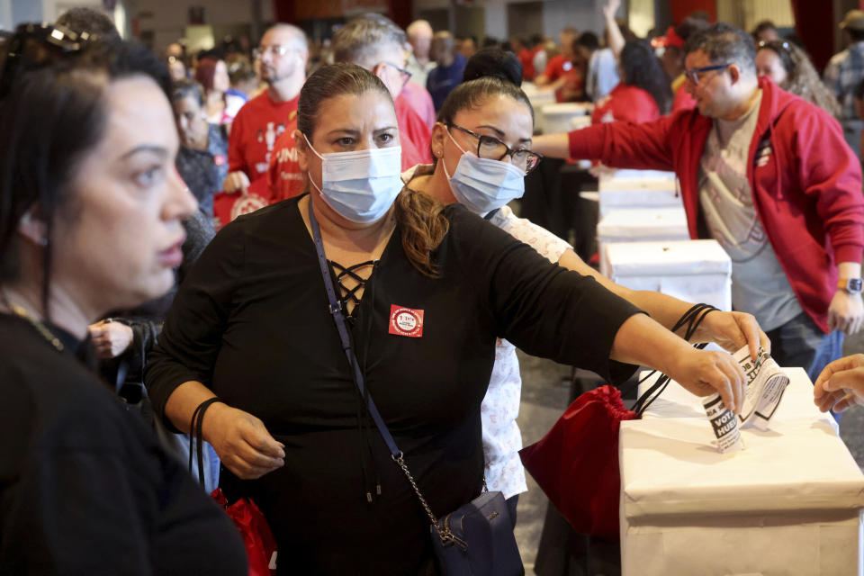 Culinary Union members cast their ballots during a strike vote, Tuesday, Sept. 26, 2023, at Thomas & Mack Center on the UNLV campus in Las Vegas. Tens of thousands of hospitality workers who keep the iconic casinos and hotels of Las Vegas humming were set to vote Tuesday on whether to authorize a strike amid ongoing contract negotiations. (K.M. Cannon/Las Vegas Review-Journal via AP)