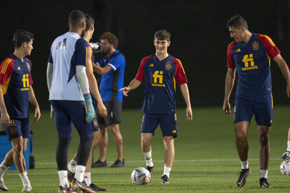 Spain's Gavi, center, works out during a training session at Qatar University, in Doha, Qatar, Friday, Dec. 2, 2022. Spain will play against Morocco in the round of 16 knockout round of the World Cup soccer tournament on Dec. 6. (AP Photo/Julio Cortez)