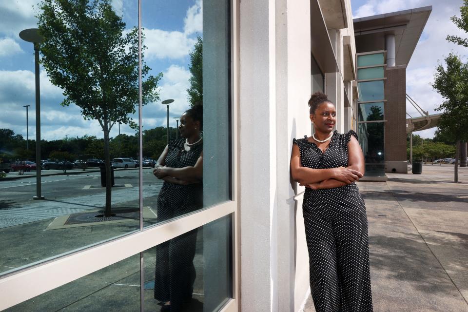 Hampton, who earns about $36,000 a year as a property leasing manager, saw her credit card debt surge to $22,000 and she was making more than $1,500 in monthly payments.