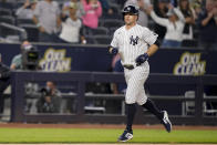 New York Yankees' Brett Gardner runs home to score after hitting a three run-home run off Cleveland Indians relief pitcher Nick Wittgren during the seventh inning of a baseball game Friday, Sept. 17, 2021, in New York. (AP Photo/John Minchillo)