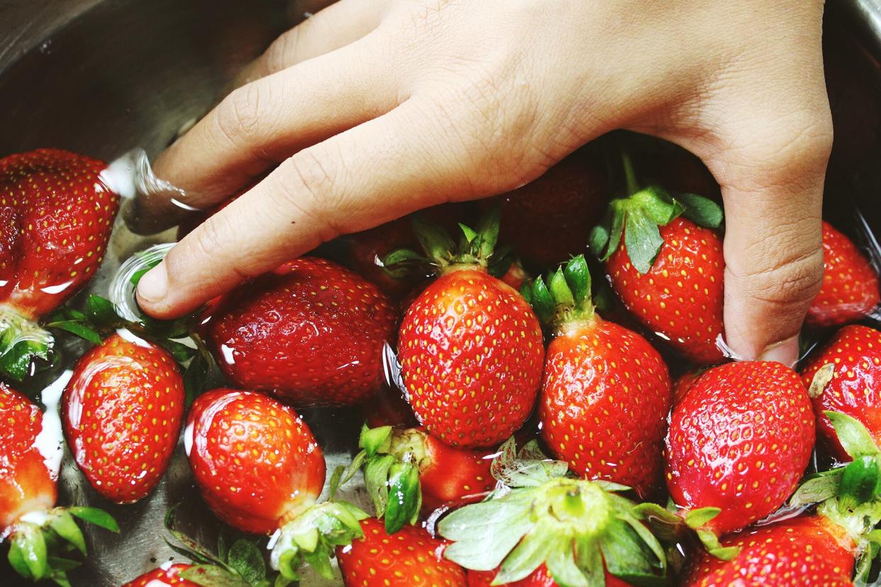 Berries being washed. (Getty Images)