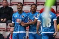 <p>Bournemouth’s Joshua King celebrates scoring their first goal with team mates </p>