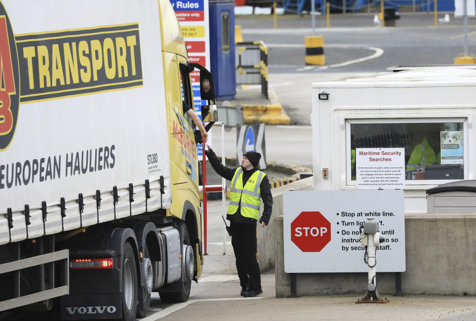 A freight lorry is checked at Larne Port, Northern Ireland, Monday, Feb. 27, 2023. The U.K. and the European Union were poised Monday to end years of wrangling and seal a deal to resolve their thorny post-Brexit trade dispute over Northern Ireland. (AP Photo/Peter Morrison)