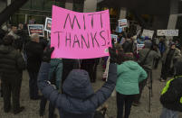 People gather in support of Sen. Mitt Romney, R-Utah, at the Wallace F. Bennett Federal Building in Salt Lake City, Utah, on Wednesday, Feb. 5, 2020. Republicans in the state are unusually divided on the president, so while some were heartened to see Romney cast what he described as an agonizing vote dictated by his conscience, Trump supporters were left angry and frustrated. (Francisco Kjolseth/The Salt Lake Tribune via AP)