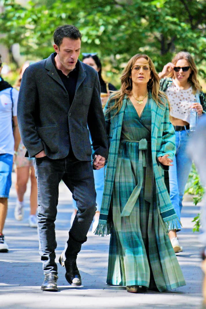 Jennifer Lopez and Ben Affleck head out for a walk in Madison Square Park in New York, Sept. 26. - Credit: MEGA