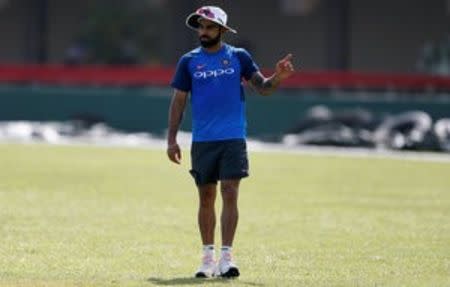 Cricket - Sri Lanka v India - India's Team Practice Session - Galle, Sri Lanka - July 25, 2017 - India's captain Virat Kohli gestures ahead of their first test match. REUTERS/Dinuka Liyanawatte