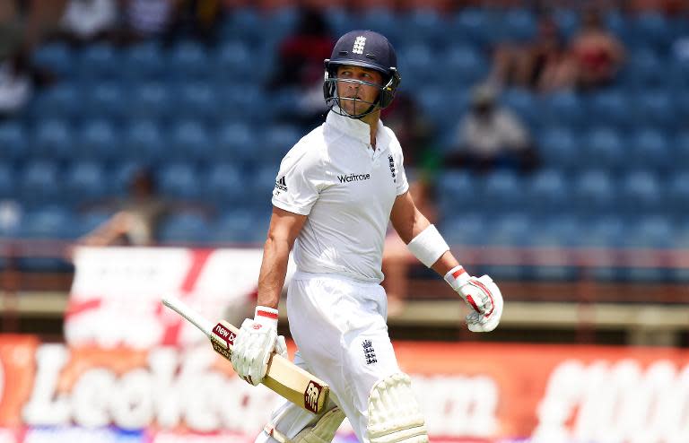 England's batsman Jonathan Trott leaves the field after being dismissed during day three of the second Test cricket match between the West Indies and England at the Grenada National Stadium in Saint George's on April 23, 2015