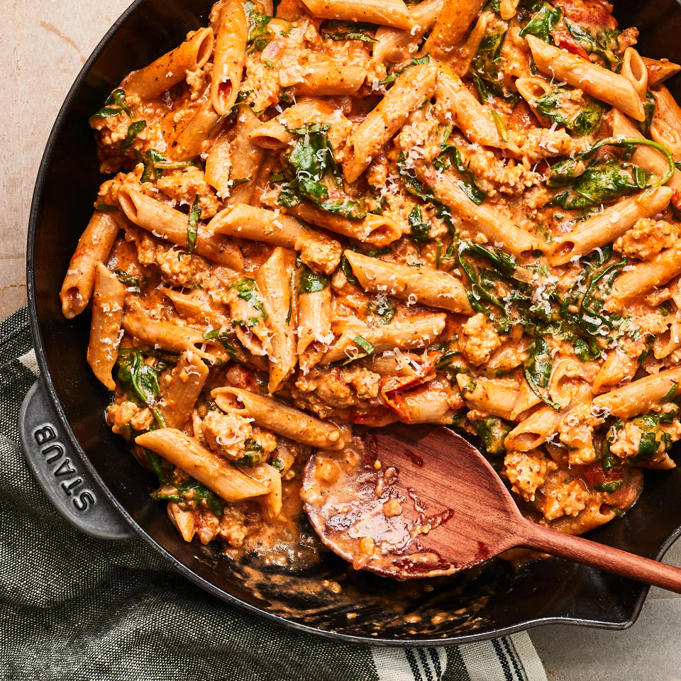 <p>Make this cheesy ground chicken pasta recipe for a busy weeknight dinner. Serve with a simple side salad and a glass of red wine. <a href="https://www.eatingwell.com/recipe/7919176/one-skillet-cheesy-ground-chicken-pasta/" rel="nofollow noopener" target="_blank" data-ylk="slk:View Recipe" class="link ">View Recipe</a></p>