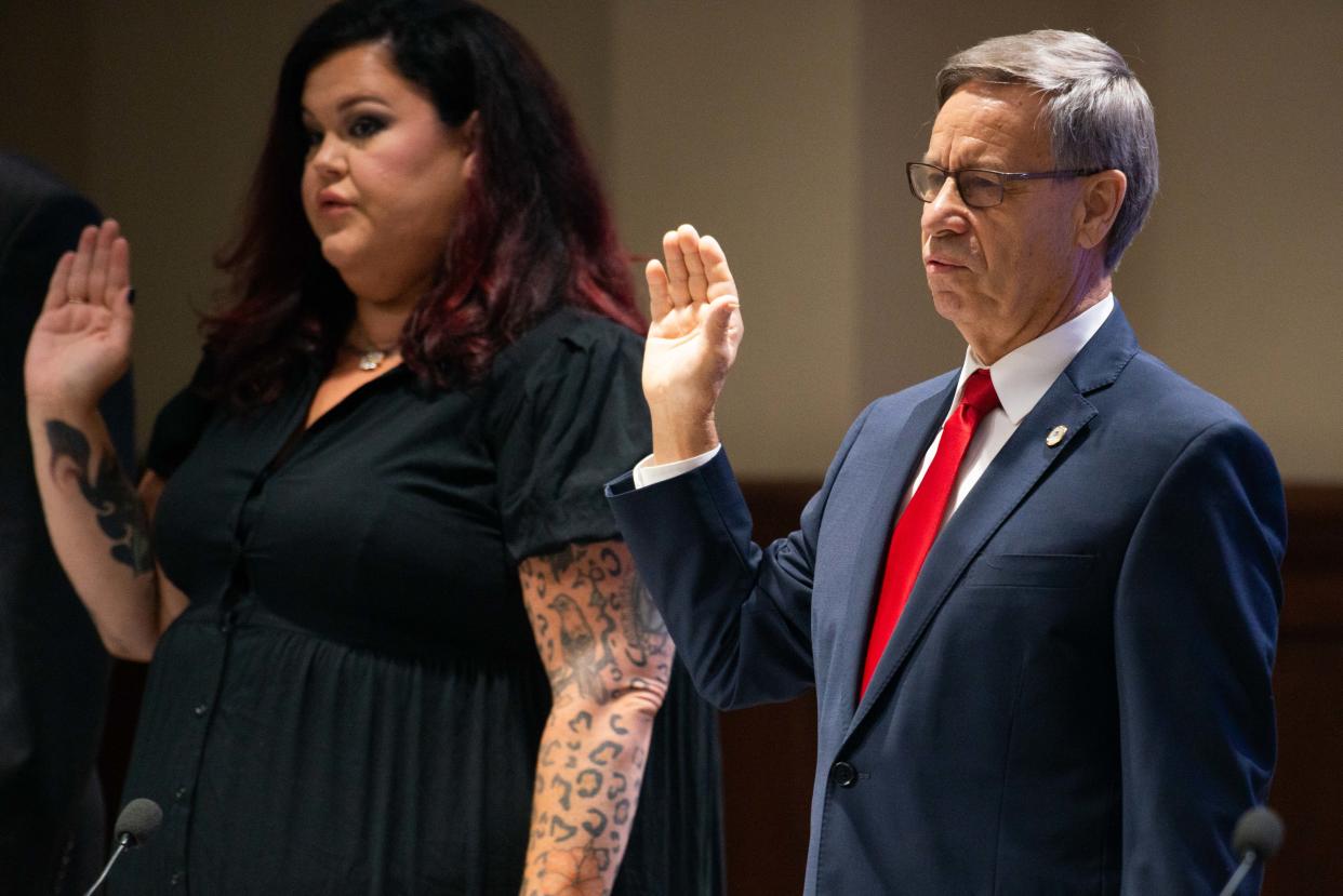 Newly elected council members Julie Holt and Larry Lowrance are sworn in to their new positions during the Jackson City Council Meeting inside Jackson City Hall on Thursday, July 6, 2023.