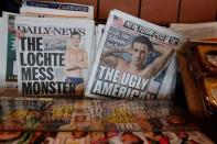 The front pages of the New York Post and the New York Daily News display the image of U.S. Olympic swimmer Ryan Lochte in New York, U.S., August 19, 2016. REUTERS/Lucas Jackson