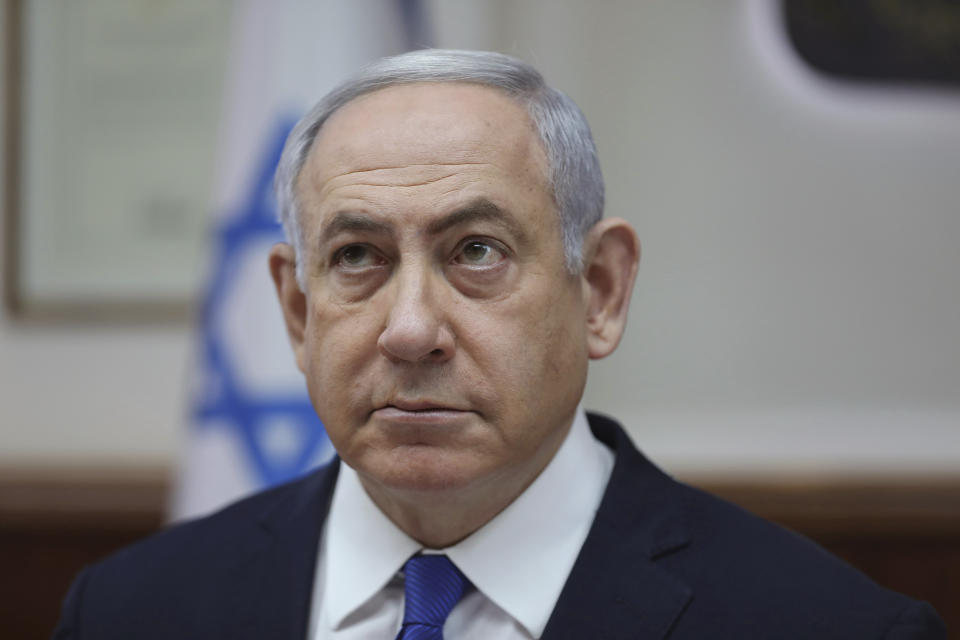 Israeli Prime Minister Benjamin Netanyahu attends the weekly cabinet meeting at his office in Jerusalem, Israel, Sunday, Dec. 29, 2019. (Abir Sultan /Pool photo via AP)