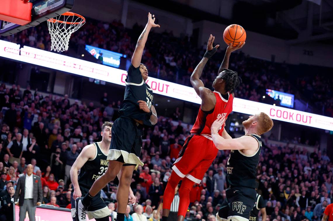 N.C. State’s Terquavion Smith (0) makes the basket with 38 seconds left in the game to put the Wolfpack up by 3 during N.C. State’s 79-77 victory over Wake Forest at Joel Coliseum in Winston-Salem, N.C., Saturday, Jan. 28, 2023. Ethan Hyman/ehyman@newsobserver.com
