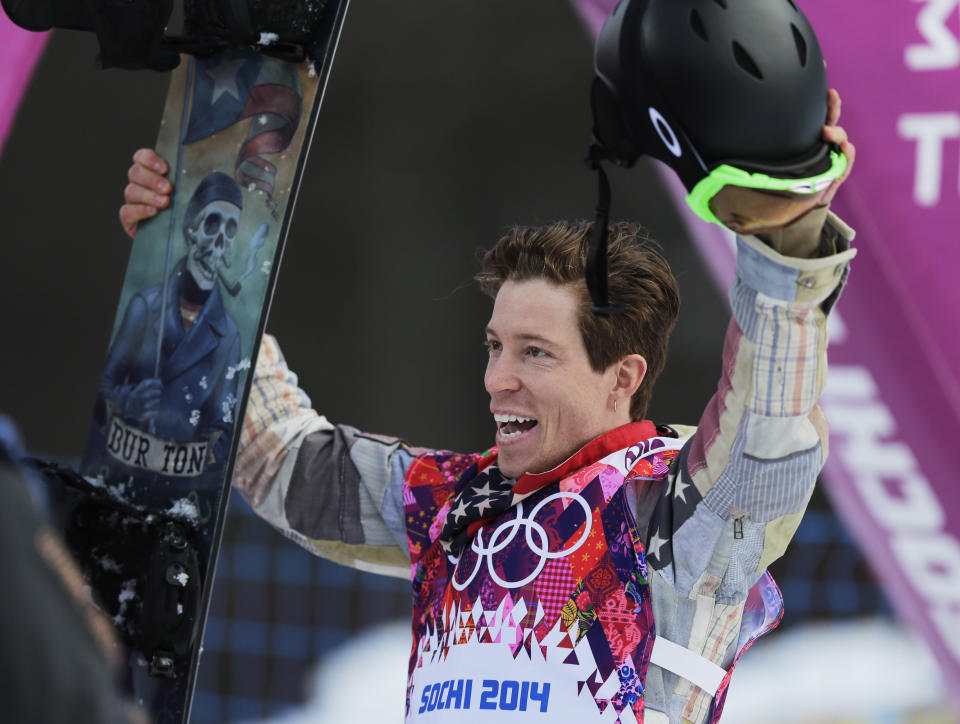 FILE - Shaun White waves to the crowd after a run during the men's snowboard halfpipe qualifying at the Winter Olympics, in Krasnaya Polyana, Russia, Feb. 11, 2014. A key part in the first episode of the documentary series “Shaun White: The Last Run” zeroes in on the exact moment White decided to try to make a living out of snowboarding instead of trying to make friends. The four-part series documenting White's life and career starts Thursday, July 6, 2023, on MAX. (AP Photo/Andy Wong, File)