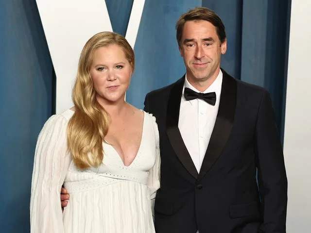 Arturo Holmes/FilmMagic Amy Schumer and Chris Fischer