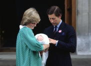 <p>Being presented for the first time outside The Lindo Wing of St Mary’s Hospital by his parents Prince Charles and Princess Diana. <i>(Photo by Tim Graham/Getty Images)</i><br></p>