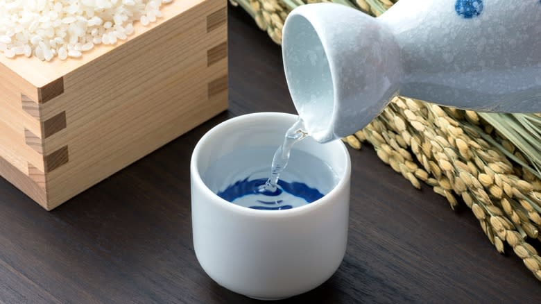 Sake being poured into cup