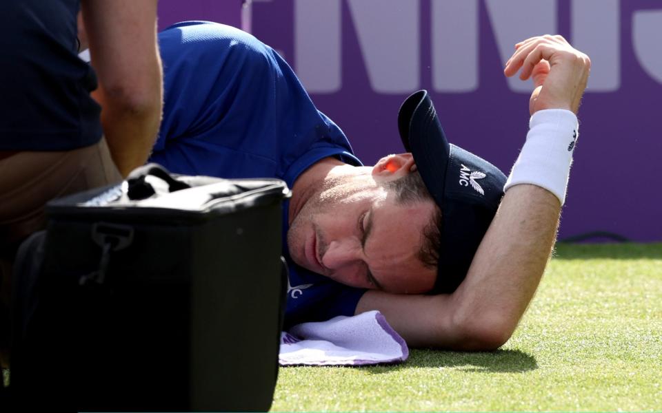 Andy Murray grimacing on court at Queen's