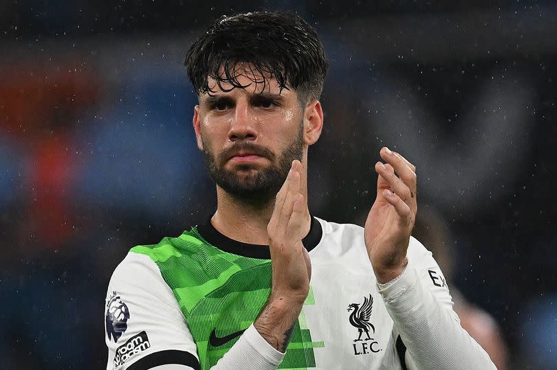 Dominik Szoboszlai of Liverpool showing his appreciation to the fans at the end of the Premier League match against Aston Villa at Villa Park on May 13 2024