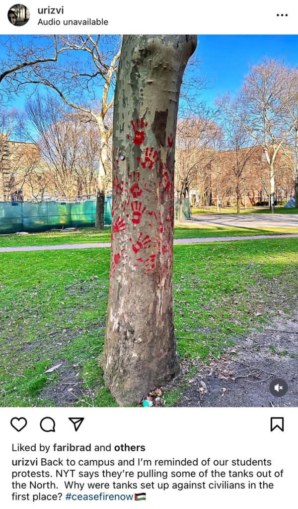 A tree on Pratt Institutes’s campus in Brooklyn with red handprints painted on it to protest Israel’s war in Gaza. urizvi/Instagram