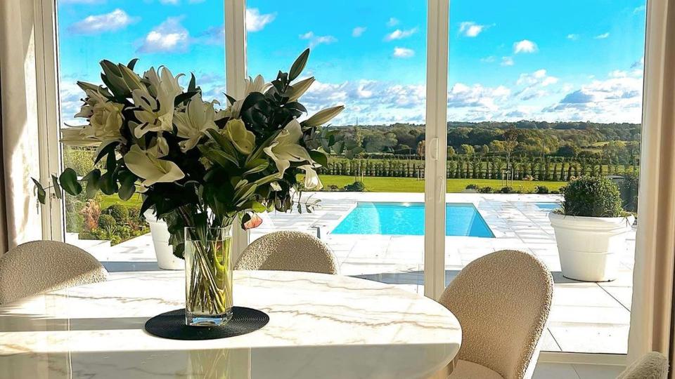 Photo of Michelle Keegan's kitchen looking out onto pool