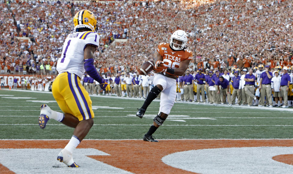 Texas Longhorns running back Keaontay Ingram #26 drops a pass as LSU Tigers cornerback Kristian Fulton #1 moves in on the play Saturday Sept. 7, 2019 at Darrell K Royal-Texas Memorial Stadium in Austin, Tx. ( Photo by Edward A. Ornelas )