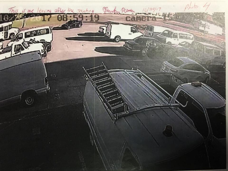 A surveillance image shows a picture of a black car, numerous parked vehicles, and the handwritten notation, "This is me leaving after the shooting," along with what looks like Brandon Pittman's signature. Pittman left the shooting scene and was later charged in a separate homicide in Georgia.