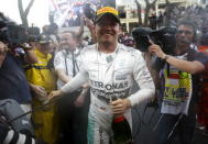 Mercedes Formula One driver Nico Rosberg of Germany celebrates after winning the Monaco F1 Grand Prix May 24, 2015. REUTERS/Max Rossi