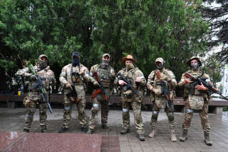 Des combattants du Groupe Wagner près du quartier général du district militaire sud à Rostov-sur-le-Don, en Russie, le 24 juin 2023.. PHOTO STRINGER/REUTERS