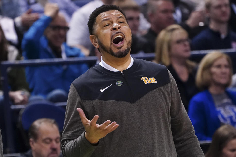 FILE - Pittsburgh head coach Jeff Capel directs his players on the court during the first half of a second-round college basketball game against Xavier in the NCAA Tournament on Sunday, March 19, 2023, in Greensboro, N.C. His sixth season brings something new: expectations. Reaching the NCAA tournament and winning a couple of games there for the first time in nearly a decade will do that. (AP Photo/John Bazemore, File)