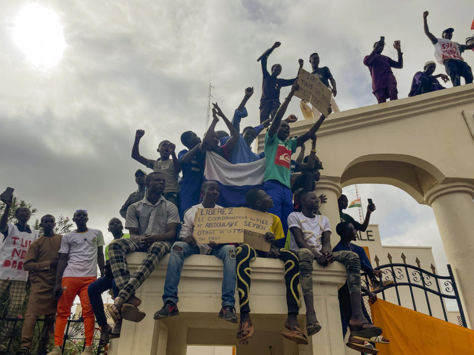 Supporters of Niger's ruling junta gather at the start of a protest called to fight for the country's freedom and push back against foreign interference in Niamey, Niger, Thursday, Aug. 3, 2023. The march falls on the West African nation's independence day from its former colonial ruler, France, and as anti-French sentiment spikes, more than one week after mutinous soldiers ousted the country's democratically elected president. (AP Photo/Sam Mednick)