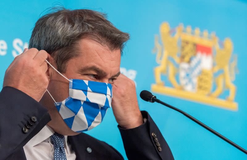 Bavarian State Prime Minister Markus Soeder attends a news conference in Munich