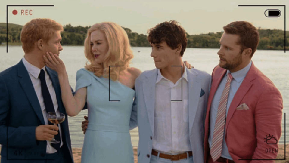 Greer Winbury and her three sons pose for a photo in Netflix's "The Perfect Couple"