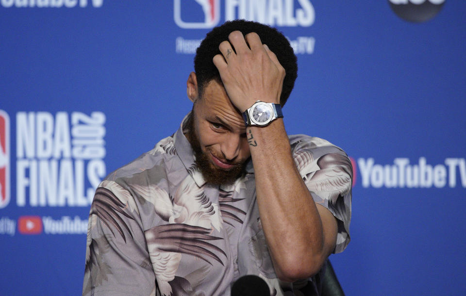 Golden State Warriors guard Stephen Curry speaks at a news conference after Game 3 of basketball's NBA Finals against the Toronto Raptors in Oakland, Calif., Wednesday, June 5, 2019. (AP Photo/Tony Avelar)