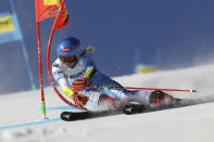 United States' Mikaela Shiffrin speeds down the course during an alpine ski World Championships giant slalom, in Meribel, France, Thursday, Feb. 16, 2023. (AP Photo/Alessandro Trovati)