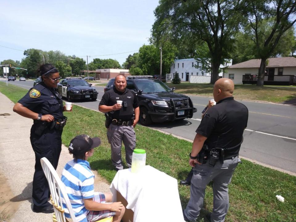 Gracen’s lemonade stand was robbed, but the Brooklyn Park police showed up to help out the young businessman. (Photo: KTIS)