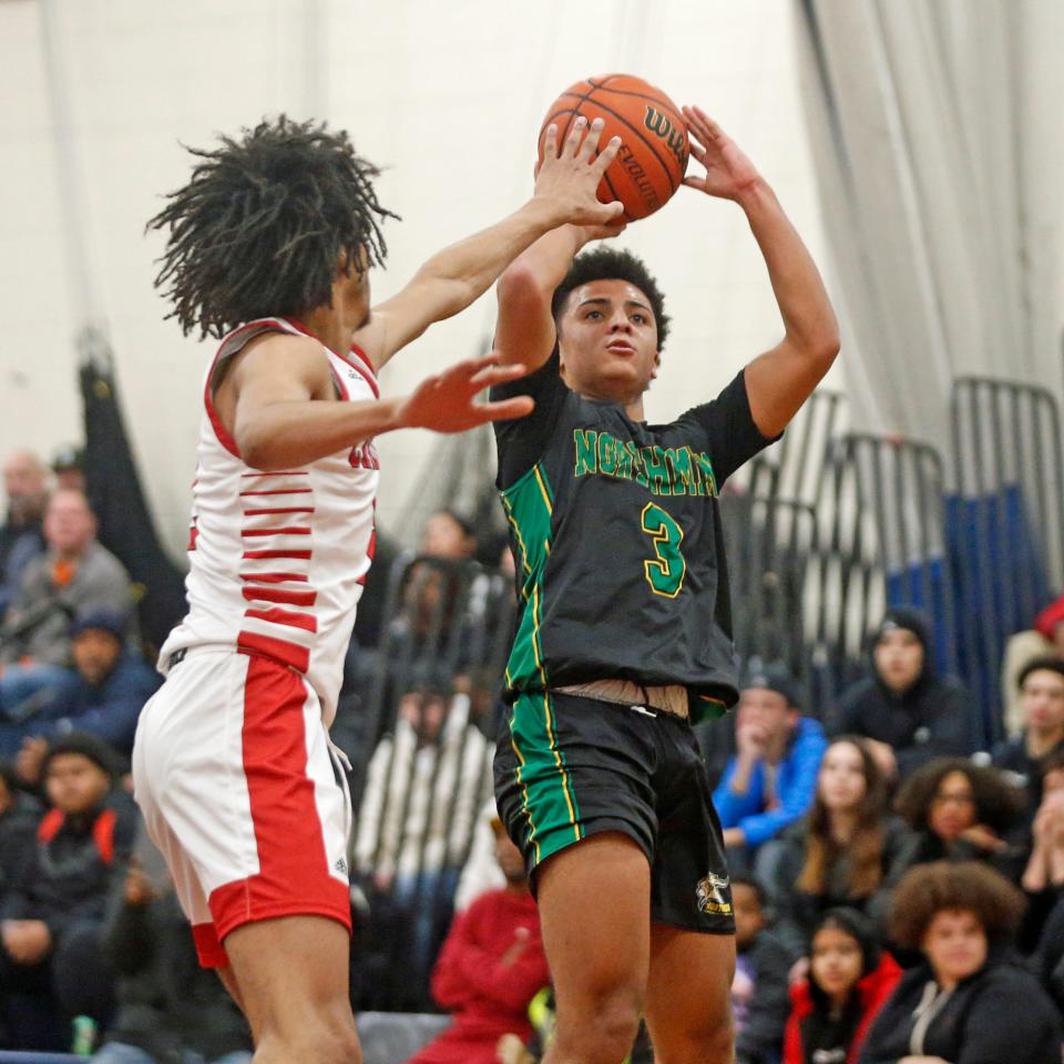 North Smithfield's Tyson Green, in action here in January, led the Northmen with  a game-high 22 points in their win over Exeter-West Greenwich in a preliminary-round playoff game on Friday night.