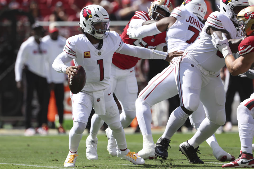 Arizona Cardinals quarterback Kyler Murray (1) scrambles out of the pocket during the first half of an NFL football game against the San Francisco 49ers in Santa Clara, Calif., Sunday, Oct. 6, 2024. (AP Photo/Jed Jacobsohn)