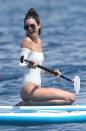 The brunette is all smiles as she enjoys some paddleboarding.