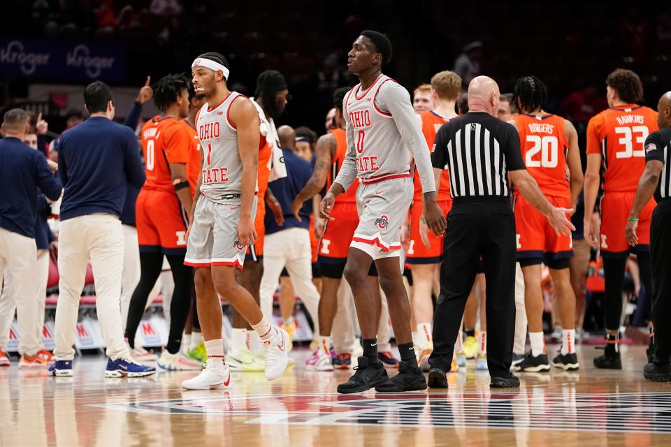 Feb 1, 2024; Columbus, Ohio, USA; Ohio State Buckeyes guards Roddy Gayle Jr. (1) and Scotty Middleton (0) walk back to the bench during the second half of the NCAA men’s basketball game against the Illinois Fighting Illini at Value City Arena. Ohio State lost 87-75.