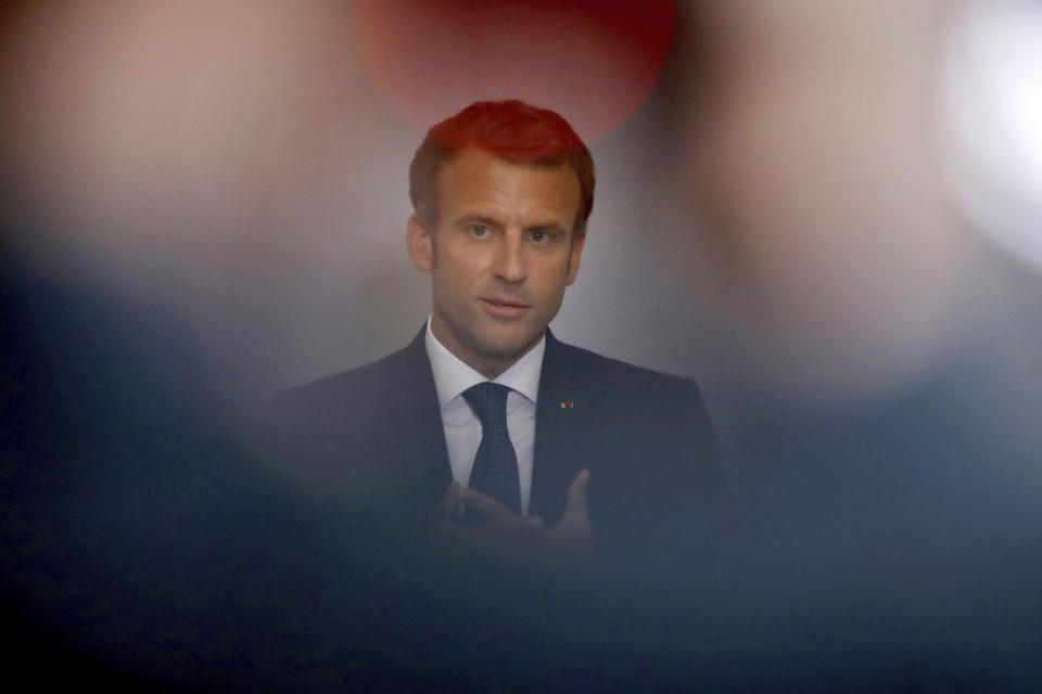 French President Emmanuel Macron delivers the closing speech at the national convention on mental health and psychiatry at the Ministry of Solidarity and Health in Paris, Tuesday, Sept. 28, 2021. Psychology appointments in France will be funded by the government starting next year, the president announced Tuesday, amid growing awareness of the importance of mental health. (Gonzalo Fuentes/Pool Photo via AP)