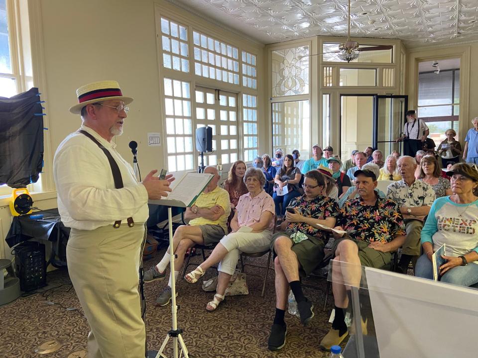 Al Whitson of the Fort Smith Historical Society speaks to guests about the original Garrison bridge.