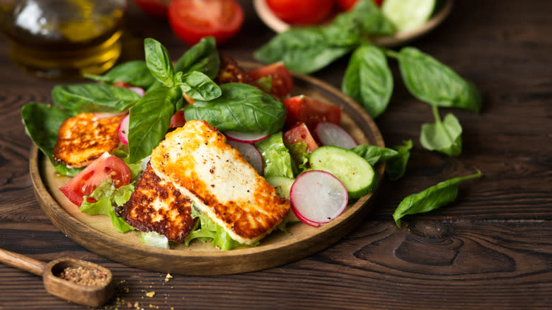 Grilled halloumi on salad