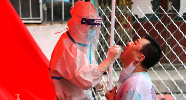 A man being tested for Covid-19 in China.