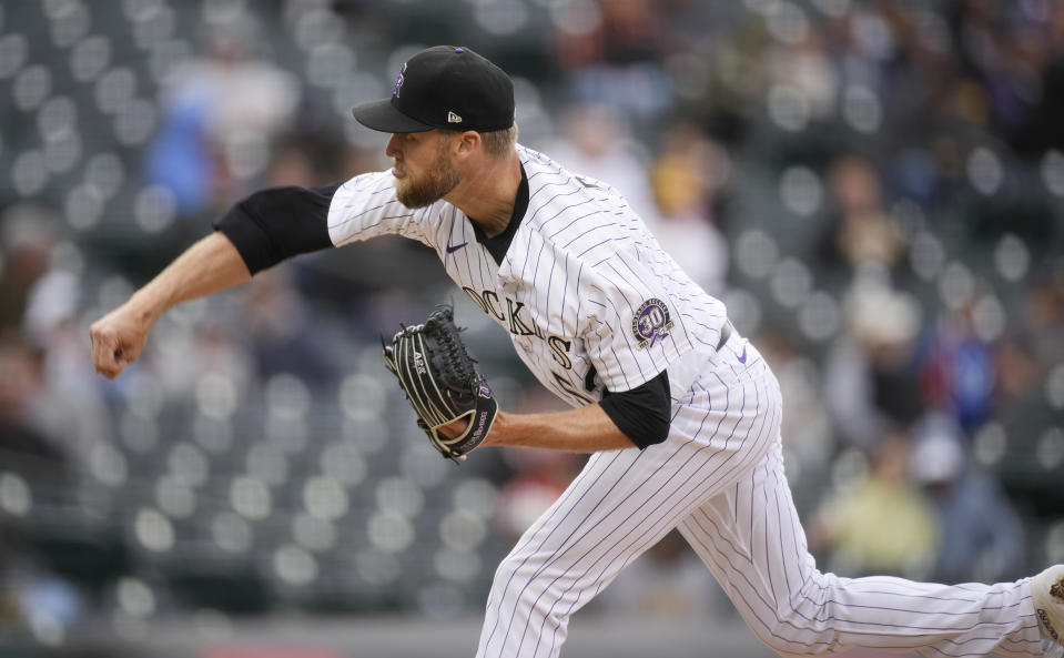 Colorado Rockies relief pitcher Daniel Bard works against the Pittsburgh Pirates in the eighth inning of a baseball game Wednesday, April 19, 2023, in Denver. (AP Photo/David Zalubowski)