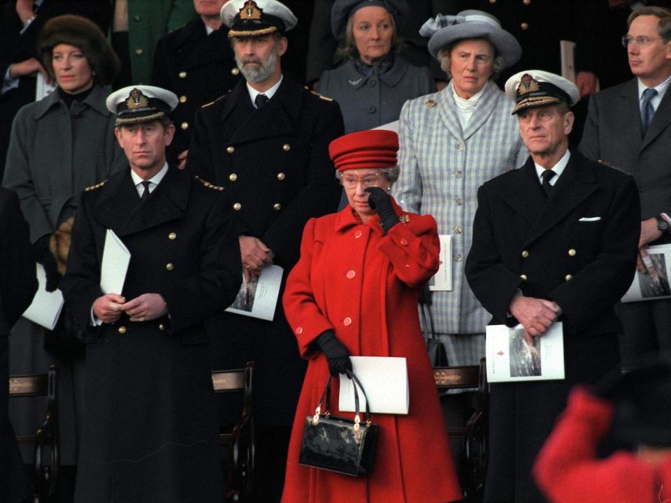 The Queen wipes a tear at the de-commissioning ceremony for the Hmy Britannia.
