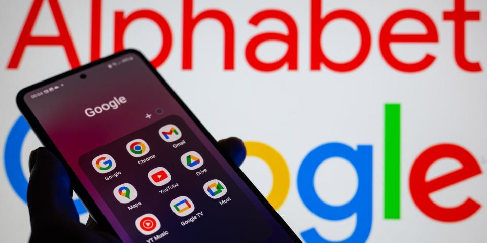 Google apps such as Gmail, Drive, Play Store, Maps, and Chrome are displayed on a smartphone with the Alphabet and Google logos visible in the background.