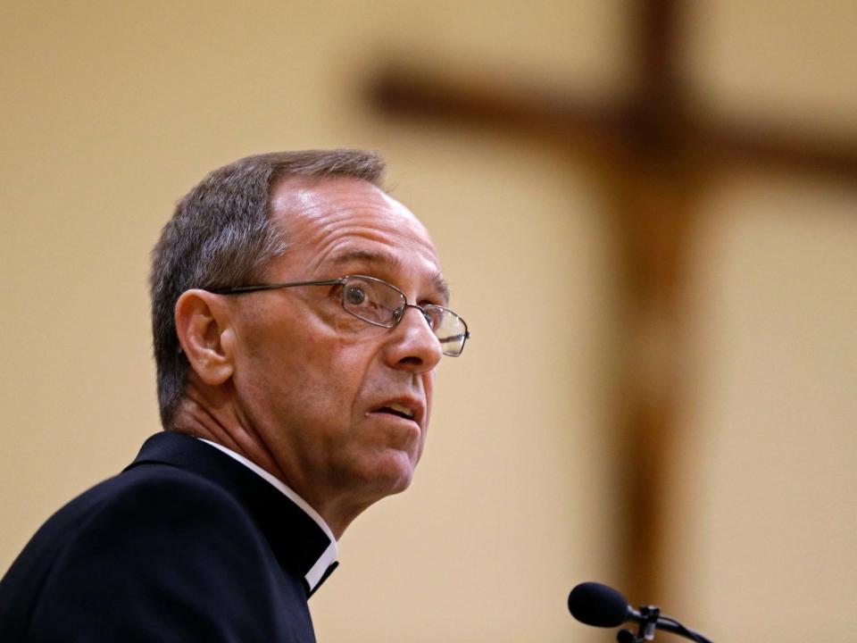 A school that refused to fire a gay teacher as ordered by the Archdiocese of Indianapolis says it has been told by church officials that it will no longer be recognised as Catholic. But school leaders pledged to keep the institution's religious identification.The archdiocese announced in a statement that it would no longer recognise Brebeuf Jesuit Preparatory School, an independently operated school, because it was not insisting that all employees "be supportive of all teachings of the Catholic Church," the Catholic News Agency reported. The church is against homosexual activity.A statement by the Reverend Brian G Paulson, who heads the Midwest Province of Jesuits, said the archdiocese told Brebeuf Jesuit Preparatory School two years ago not to renew the contract of a teacher whose "marital status does not conform to church doctrine." He also said the decision, to be formalised in a church decree, would be appealed through a church process and would go as high as the Vatican "if necessary."Leaders of Brebeuf Jesuit posted an open letter to their community on the Indianapolis school's website saying the archdiocese had directly inserted itself into a school governance matter in an "unprecedented" way and that it would not do what Archbishop Charles Thompson had demanded.The letter said in part: "Specifically, Brebeuf Jesuit has respectfully declined the Archdiocese's insistence and directive that we dismiss a highly capable and qualified teacher due to the teacher being a spouse within a civilly-recognised same-sex marriage."The unidentified teacher was said by Mr Paulson to be "a valued employee" who does not teach religion. He wrote that Brebeuf Jesuit became aware through social media "that one of its teachers entered into a civil marriage with a person of the same sex."According to the Associated Press, a school operated by the archdiocese, Indianapolis Roncalli High School, has fired or suspended two guidance counsellors in the past year because they are in same-sex marriages.Brebeuf Jesuit's leaders who signed the open letter are the Reverend William Verbryke, the school president; W Patrick Bruen, chair of the school's Board of Trustees; and Daniel M Lechleiter, chair-elect of the trustees board. They promised in the letter that the school's mission would not change as a result of this conflict with the archdiocese."We understand that this news will likely spur a host of emotions, questions and even confusion in the days ahead. Please be assured, the Archdiocese's decision will not change the mission or operations of Brebeuf Jesuit."On Friday, the school's name was not on the archdiocese's list of Catholic schools in its region.The church says there are 68 Catholic schools - 57 elementary schools and 11 high schools - in the Archdiocese of Indianapolis, according to its website. Collectively, they enrolled some 23,200 students during the 2018-2019 school year.Most of those schools are operated by a school division within the archdiocese, which is headed by Superintendent Gina Kuntz Fleming, who did not return phone calls about Brebeuf Jesuit. While Brebeuf Jesuit is a Catholic school within the archdiocese, it is independently operated. The school has nearly 800 students in grades nine through 12.The school leaders' letter said that, while the archdiocese "may choose to no longer attend or participate in the school's Masses and formal functions, Brebeuf Jesuit is, and will always be, a Catholic Jesuit school."It also said church leaders assured them that "Jesuit priests may continue to serve at Brebeuf Jesuit and will retain their ability to celebrate the sacraments of the Catholic Church."The Washington Post