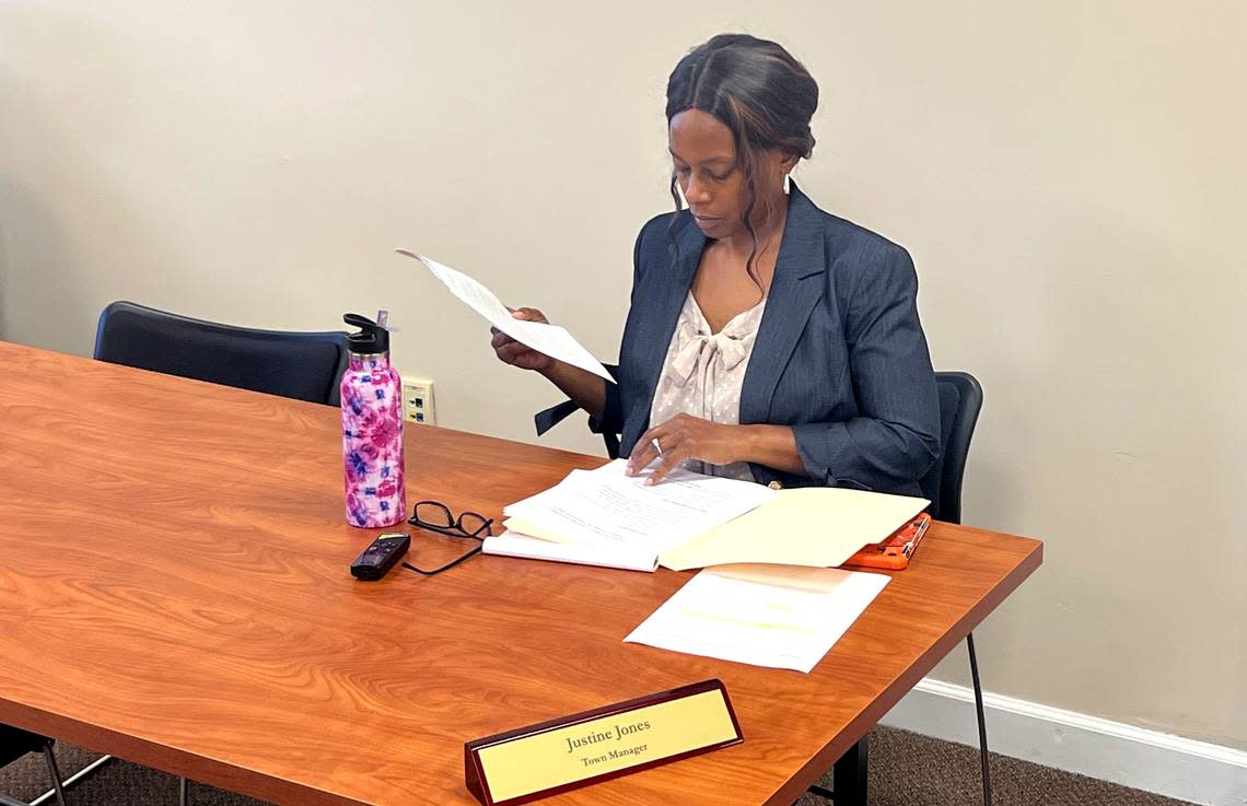 Kenly town manager Justine Jones prepares for a Town Council emergency session in Kenly N.C., Friday, July 22, 2022. The session is in response to the abrupt resignation of the police chief, four officers, and two administrators.